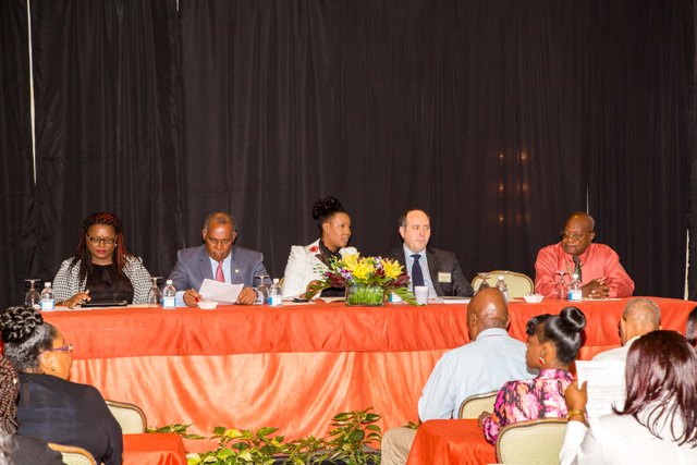 Head Table participants (l-r) Moderator, Ms. Vincia Herbert, Premier of Nevis and Minister of Finance Hon. Vance Amory, Regulator of the Nevis Financial Services Department Ms. Heidi-Lynn Sutton, Facilitator, Mr. Stephen Platt and Regulator of International Banking James Simpson